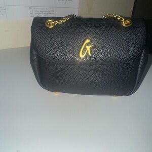 Elegant Black Shoulder Bag with Gold Accents